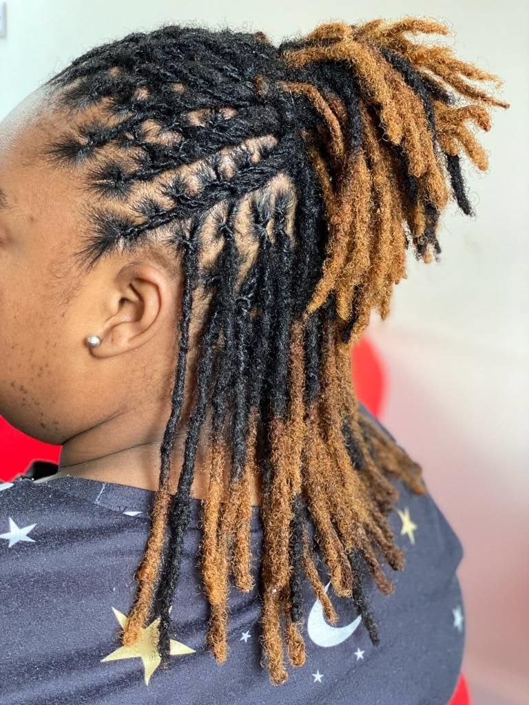 Loc style with black and honey blonde color contrast